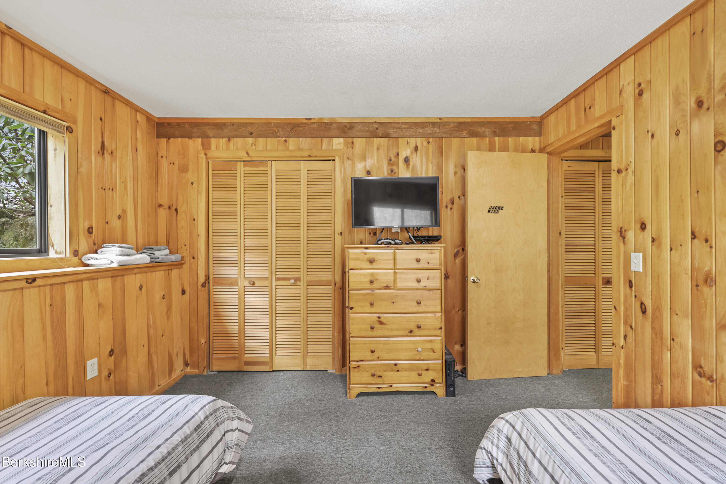 125 Town Hill Road Sandisfield, MA 01255 - Photo 30 of 42 a bedroom with a bed and furniture