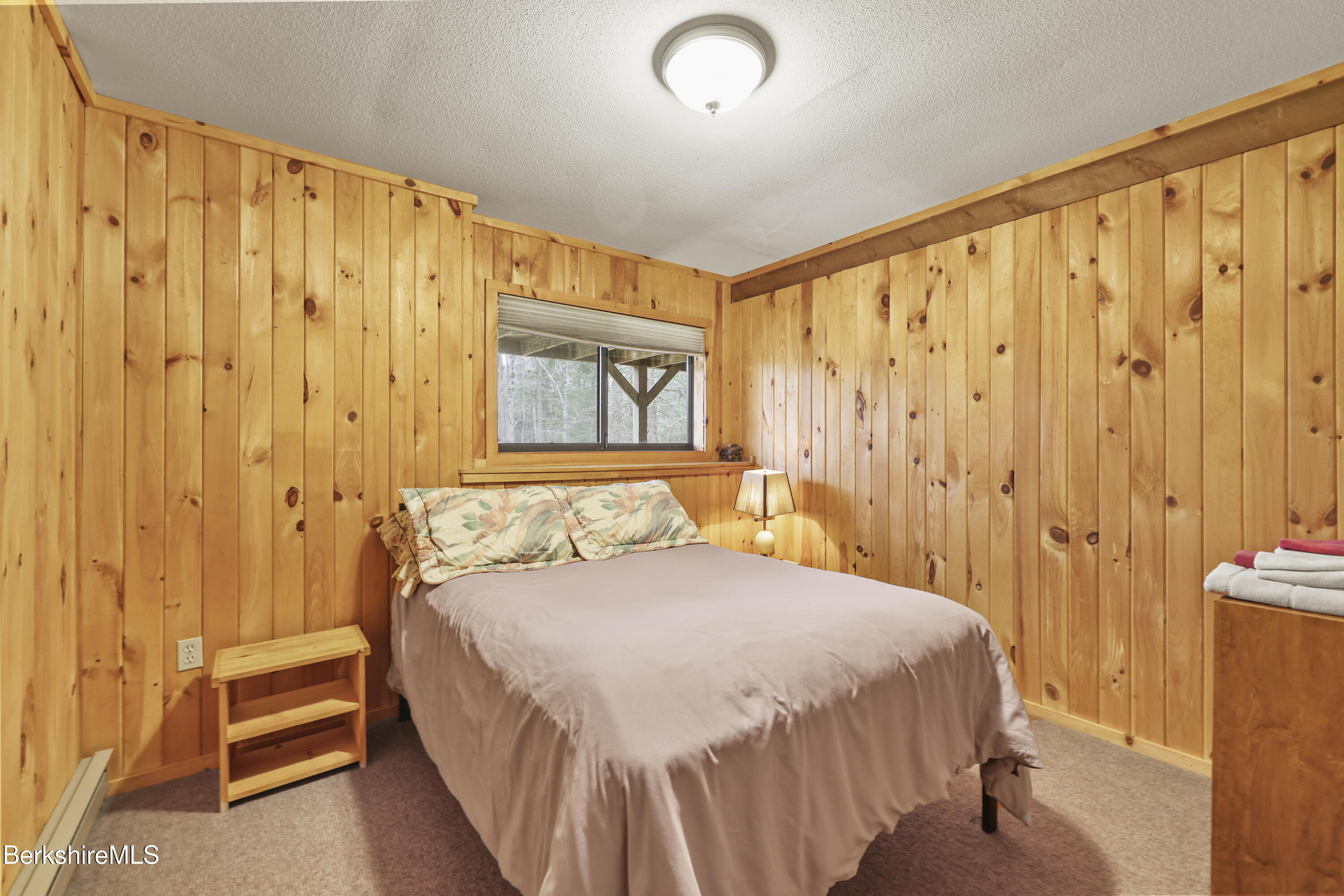125 Town Hill Road Sandisfield, MA 01255 - Photo 33 of 42 a bedroom with a bed and a window
