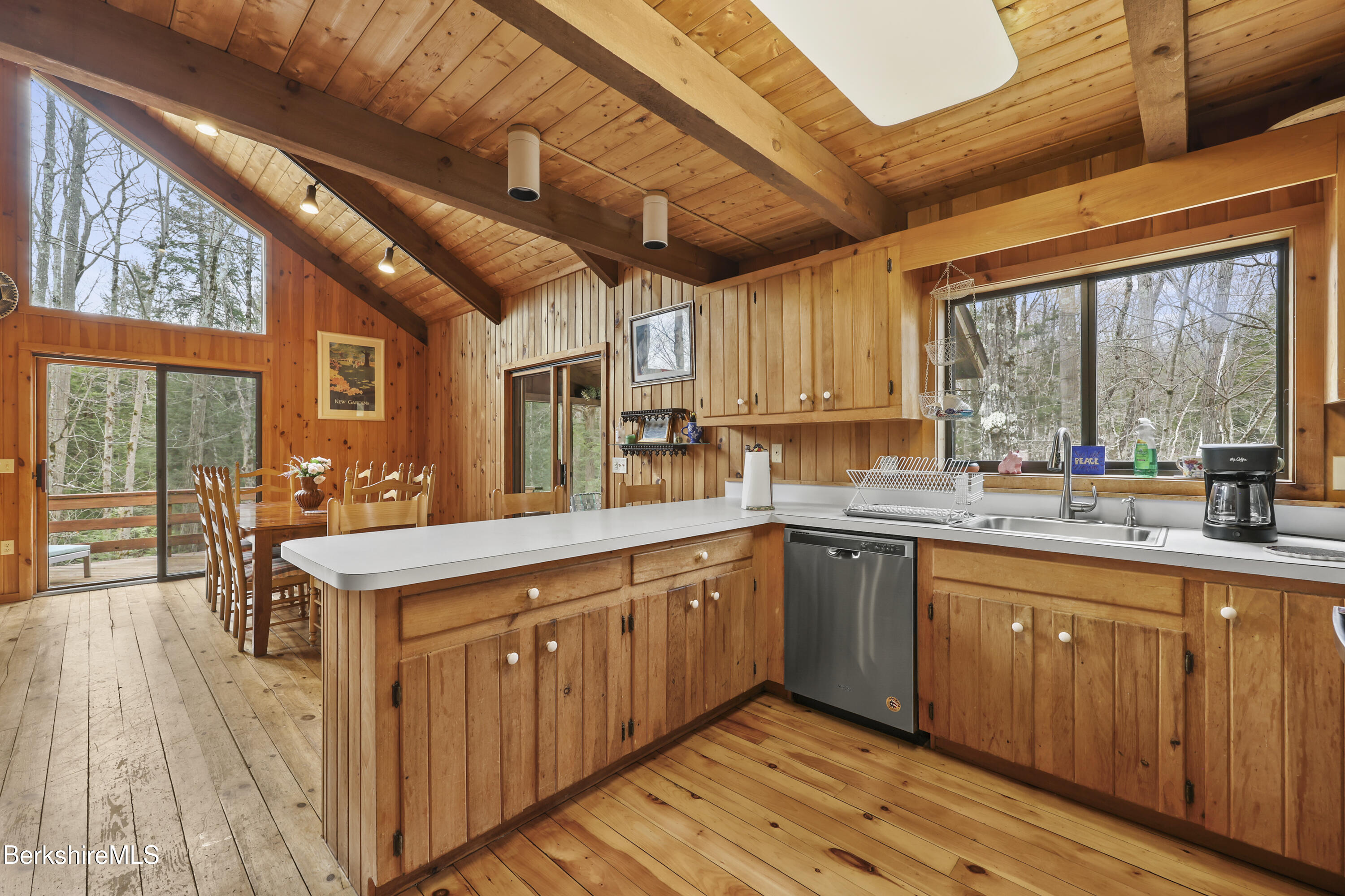 125 Town Hill Road Sandisfield, MA 01255 - Photo 9 of 42 a kitchen with wooden cabinets sink and stove
