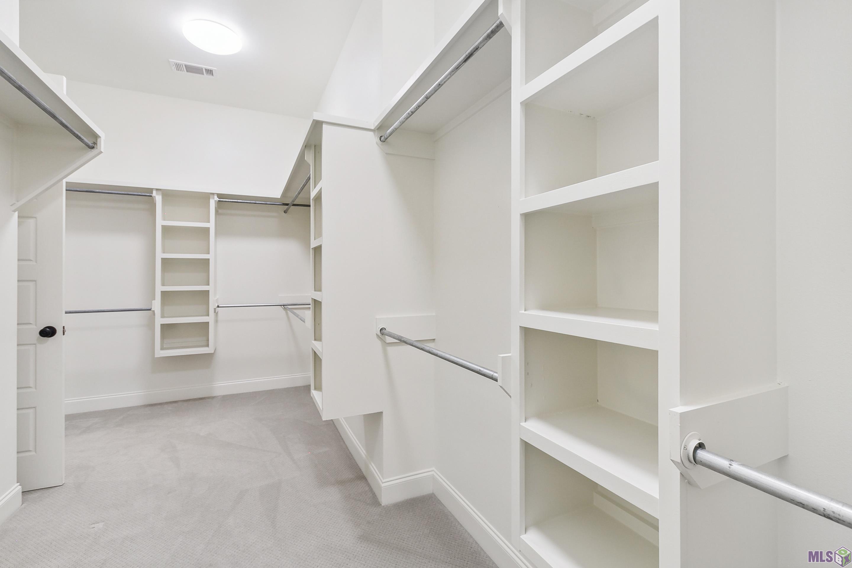 1632 Elm Row Lane Baton Rouge, LA 70810 - Photo 11 of 19 Large walk in main closet