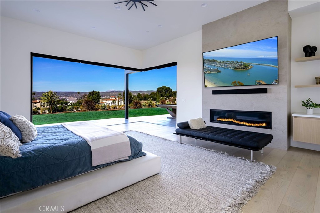 7663 East Corto Road Anaheim Hills, CA 92808 - Photo 20 of 58 Primary Bedroom West Wing - TV image is digitally enhanced