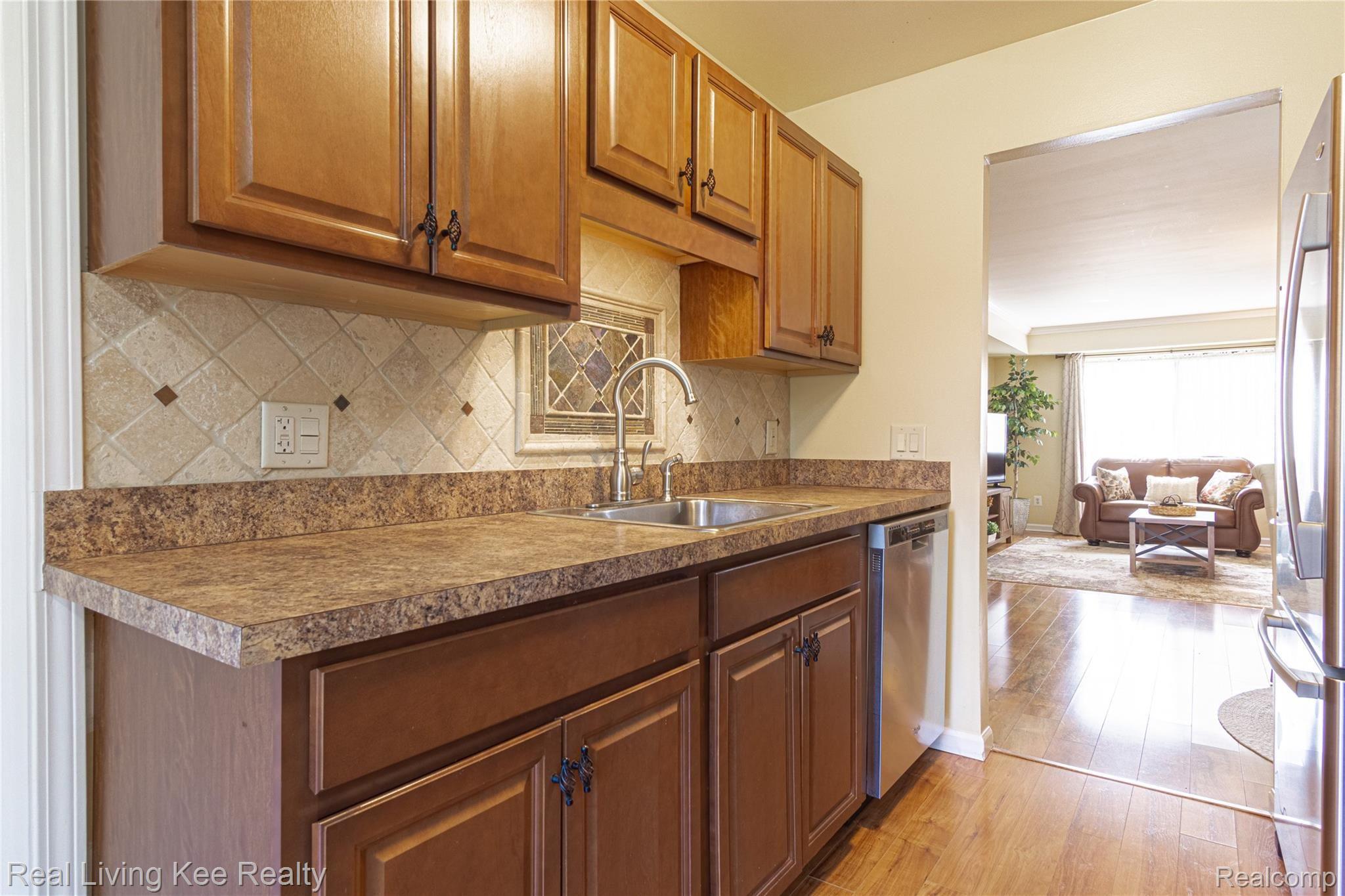 1853 Meadow Dale Court Rochester, MI 48309 - Photo 13 of 43 Nicely Updated Kitchen with Stainless Appliances