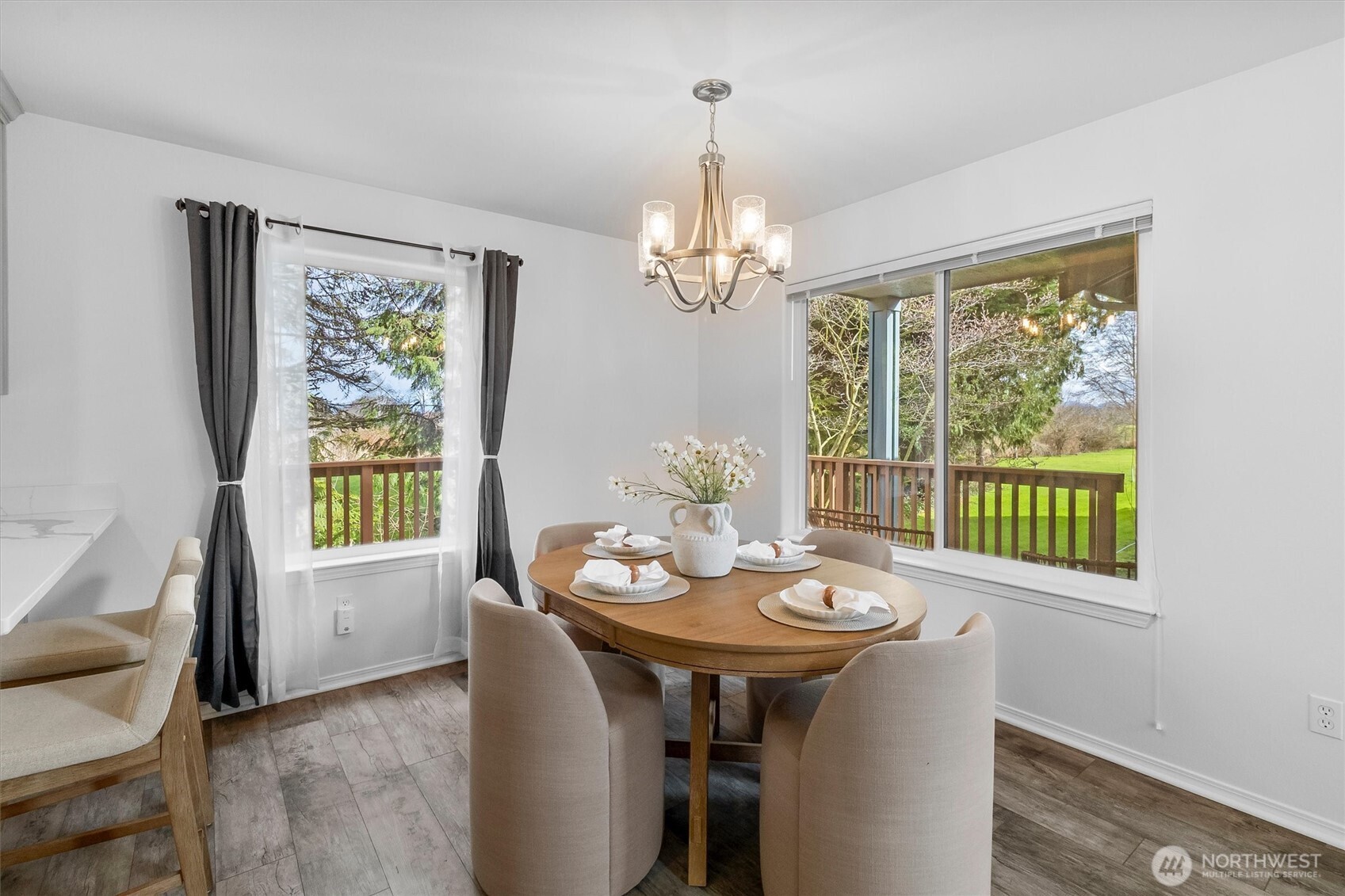 705 Finley Lane, Unit N2 La Conner, WA 98257 - Photo 11 of 38 a view of a dining room with furniture window and outside view