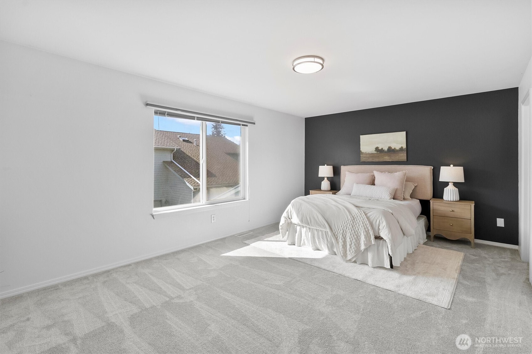 705 Finley Lane, Unit N2 La Conner, WA 98257 - Photo 20 of 38 a bedroom with a bed and a window