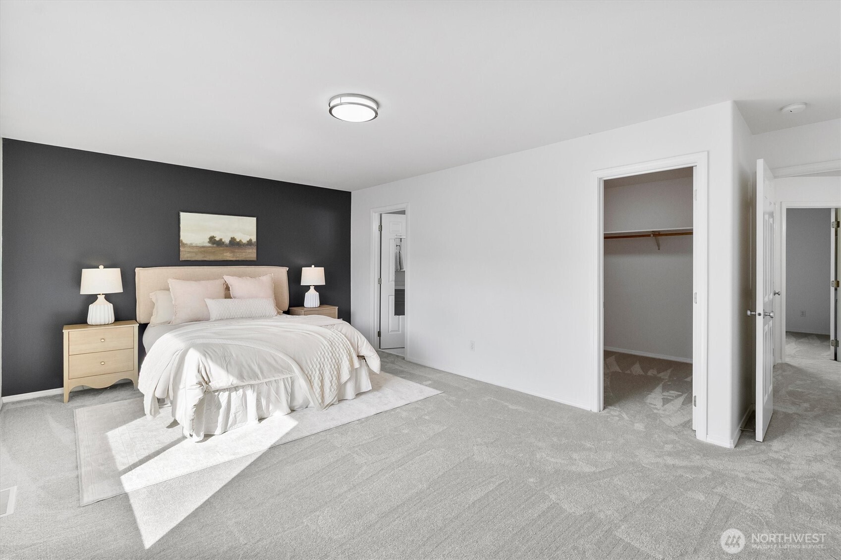 705 Finley Lane, Unit N2 La Conner, WA 98257 - Photo 21 of 38 a bedroom with a bed and a couch