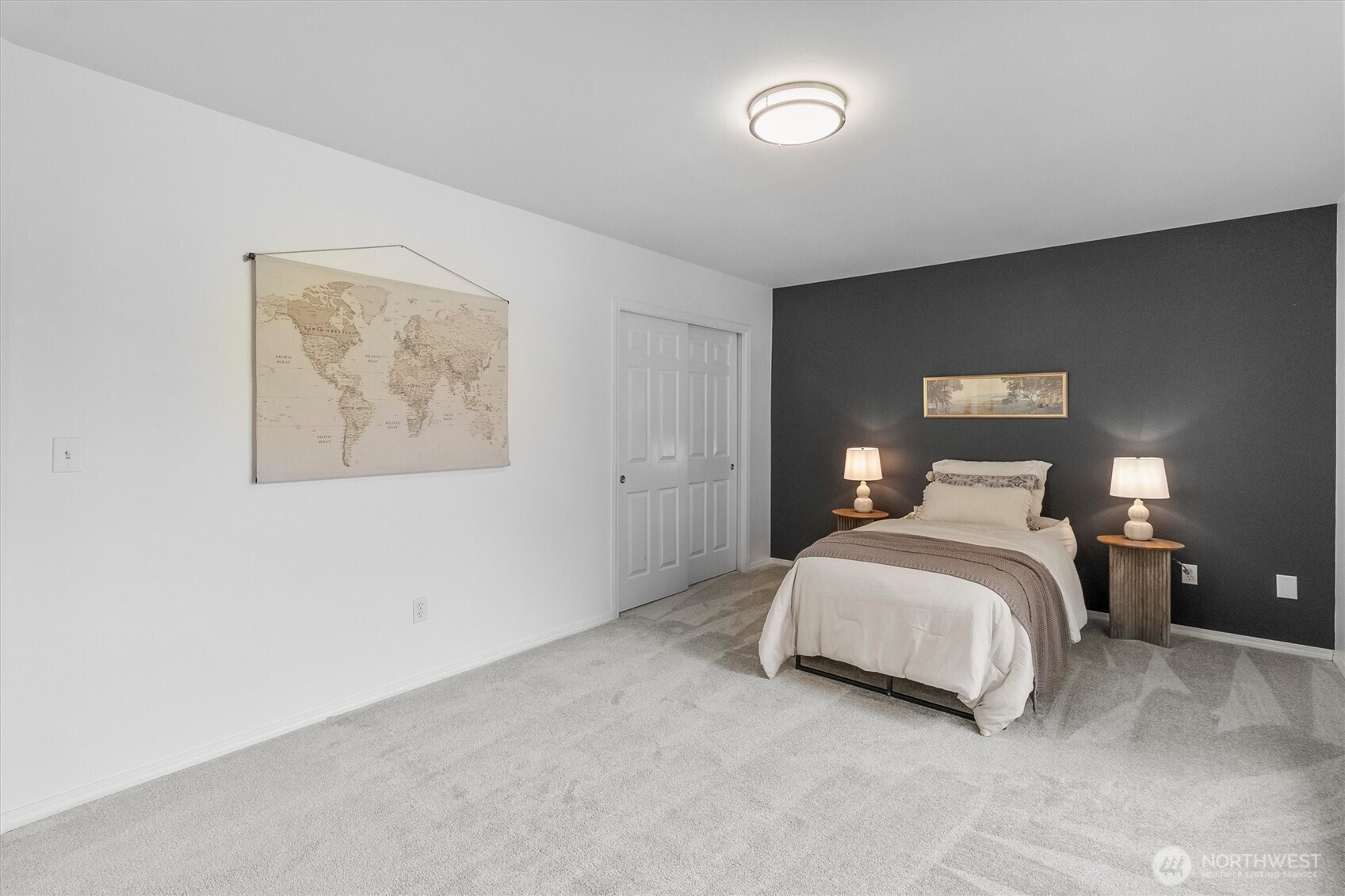 705 Finley Lane, Unit N2 La Conner, WA 98257 - Photo 25 of 38 a bedroom with a bed and lamp