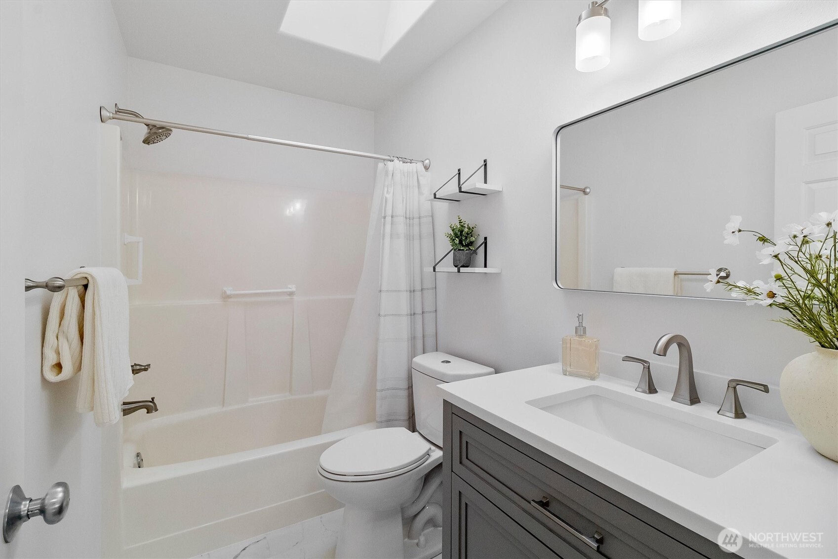 705 Finley Lane, Unit N2 La Conner, WA 98257 - Photo 26 of 38 a bathroom with a sink a toilet and shower