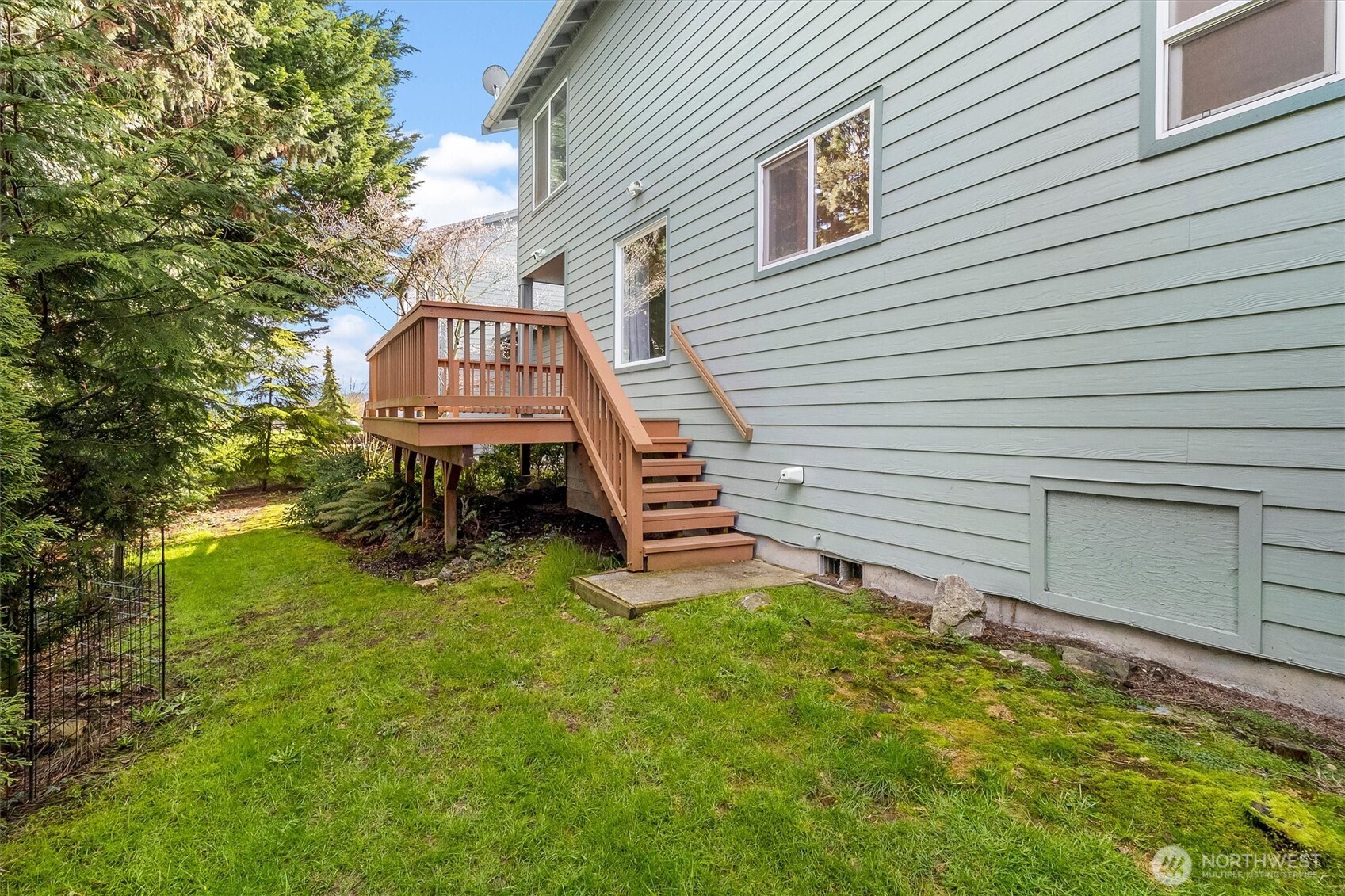 705 Finley Lane, Unit N2 La Conner, WA 98257 - Photo 30 of 38 a front view of a house with a yard