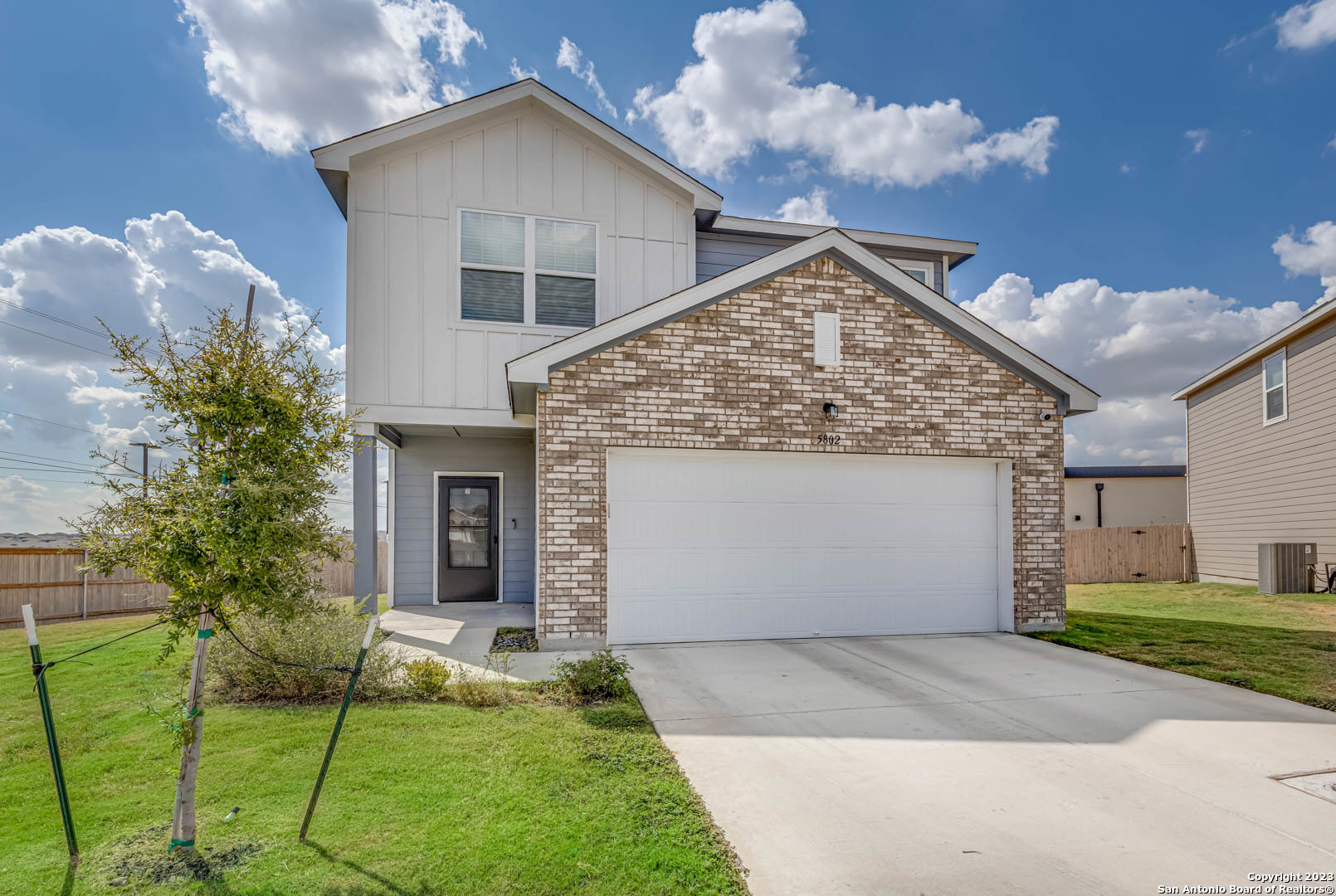 a front view of house with yard