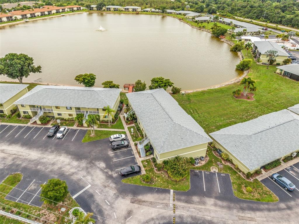 25225 Rampart Boulevard, Unit 1604 Punta Gorda, FL 33983 - Photo 35 of 41 an aerial view of a house with a lake view