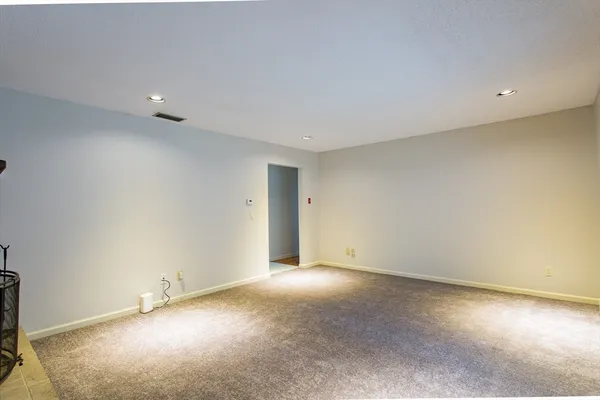 an empty room with a natural light