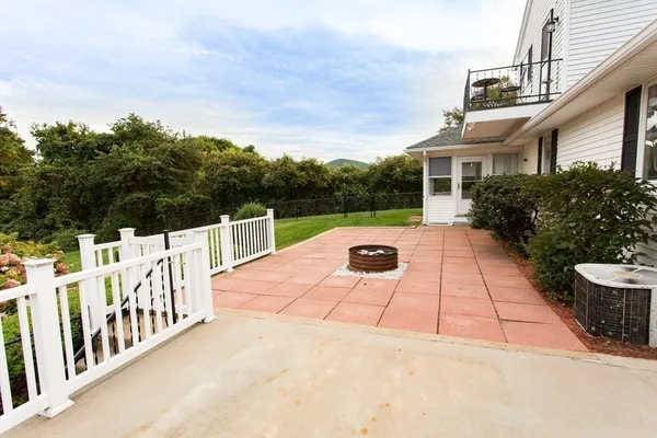 a house view with a garden space