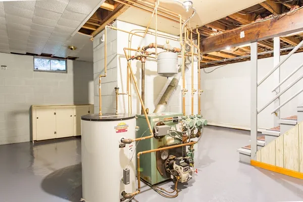 a utility room with a sink dryer and washer