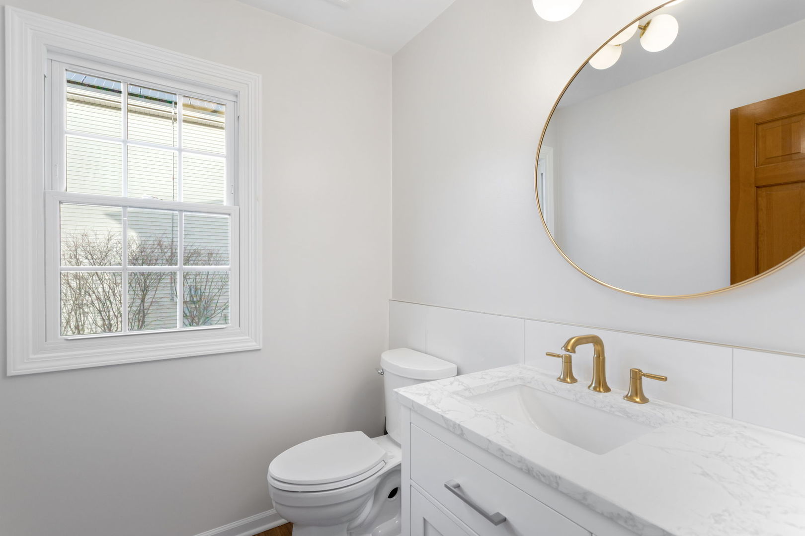 537 Arbor Lane Oswego, IL 60543 - Photo 17 of 33 a bathroom with a sink a toilet and a mirror