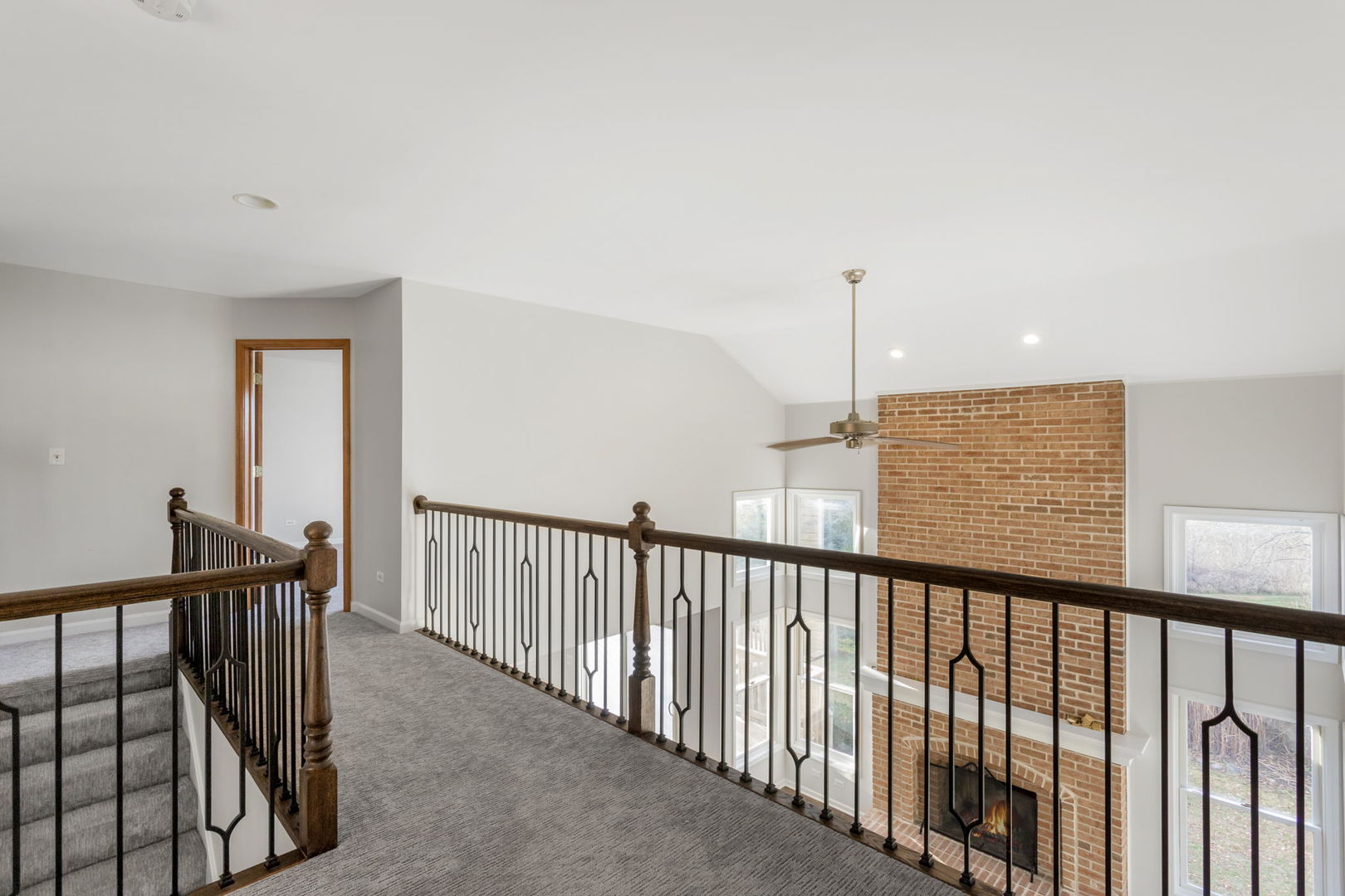 537 Arbor Lane Oswego, IL 60543 - Photo 18 of 33 a view of a balcony with wooden floor