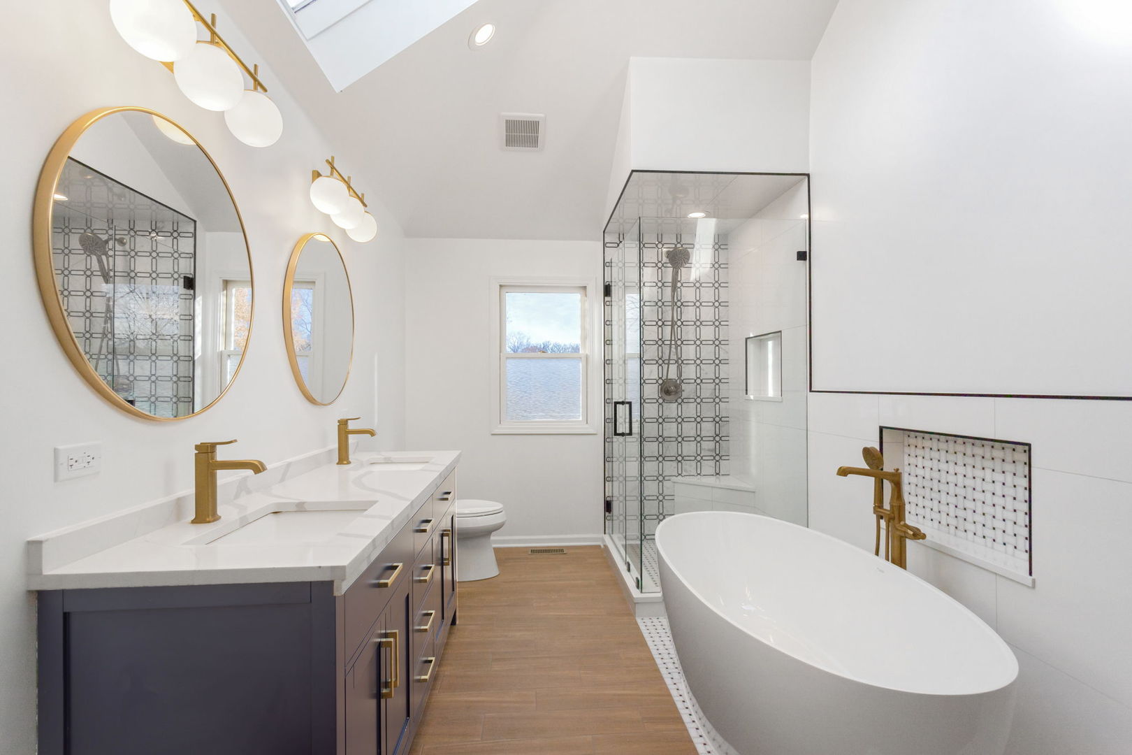 537 Arbor Lane Oswego, IL 60543 - Photo 21 of 33 a bathroom with a sink a toilet and a mirror