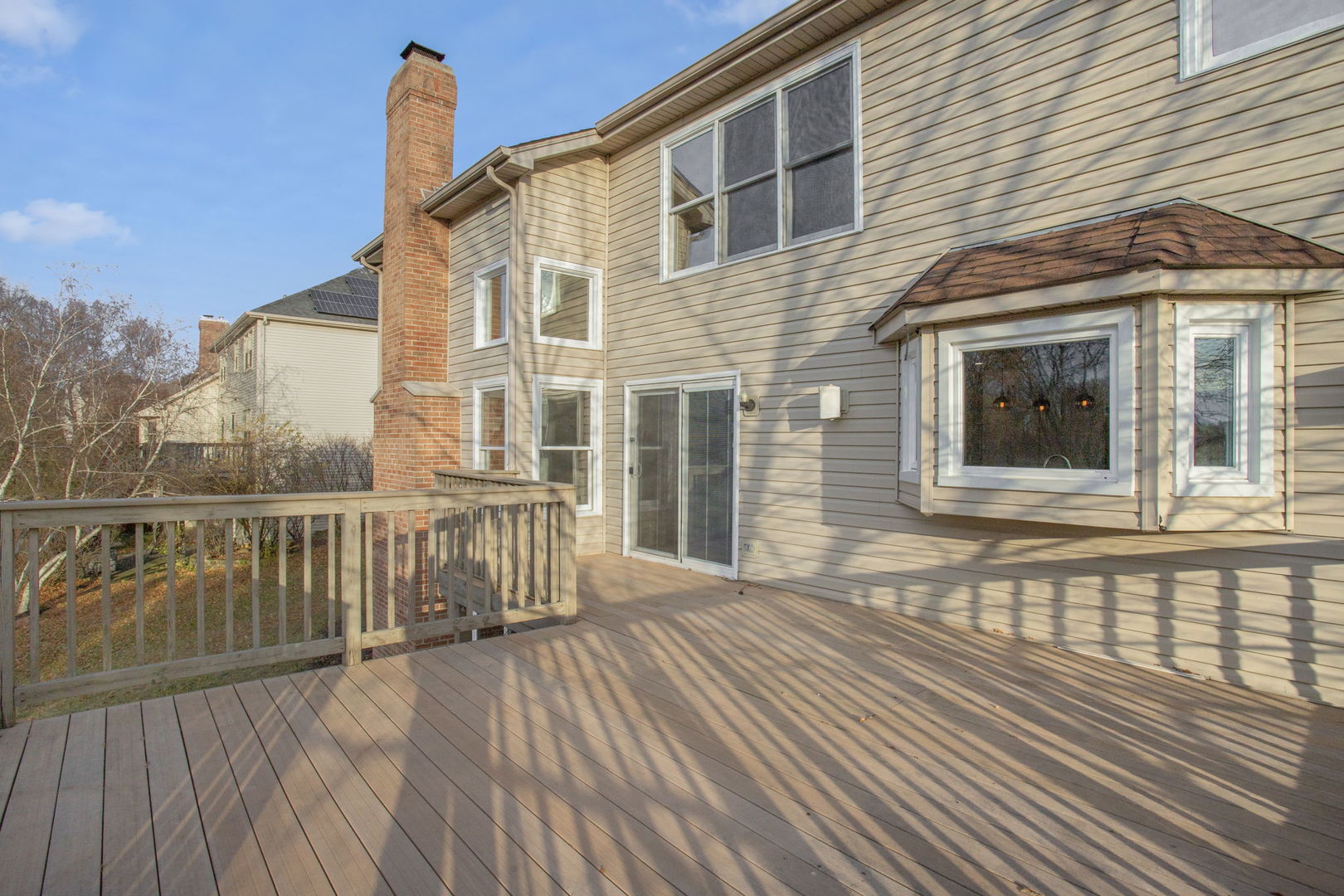 537 Arbor Lane Oswego, IL 60543 - Photo 4 of 33 a view of a brick house with large windows