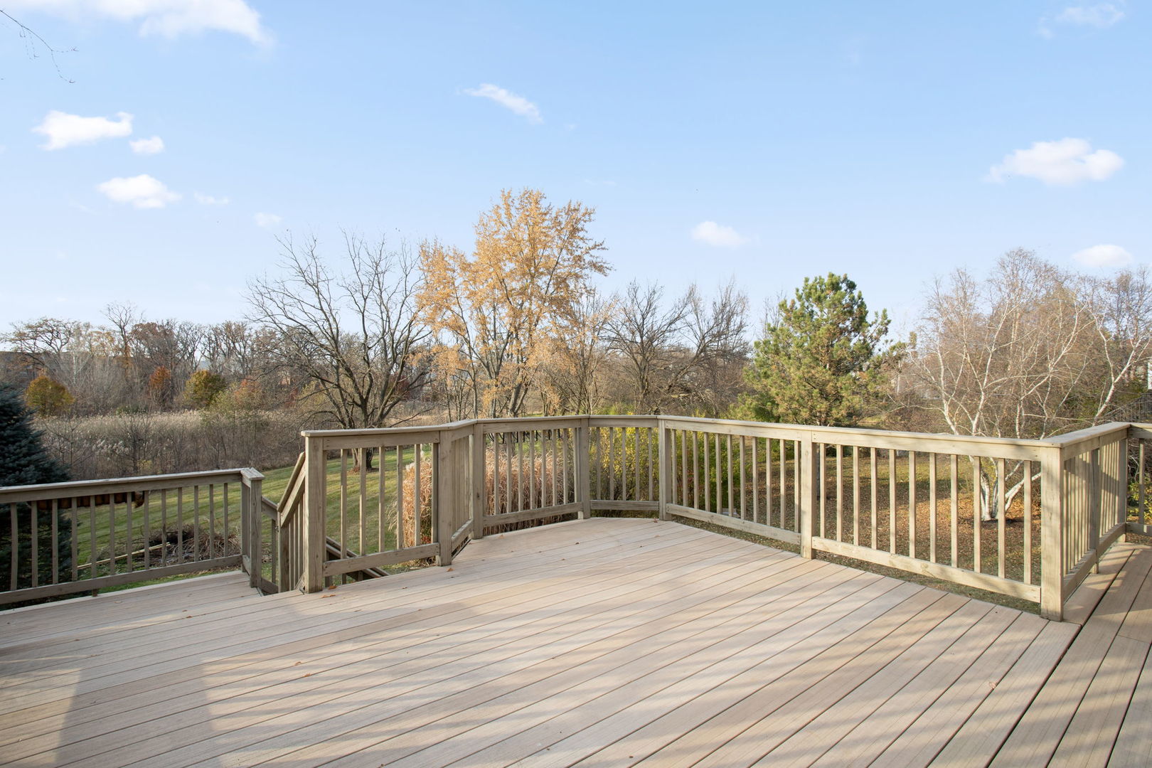 537 Arbor Lane Oswego, IL 60543 - Photo 5 of 33 a view of balcony with deck and trees