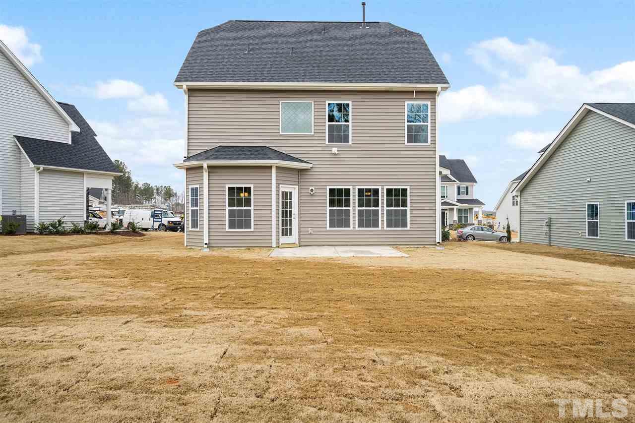 112 Edmer Lane Garner, NC 27529 - Photo 2 of 24 a front view of a house with a yard