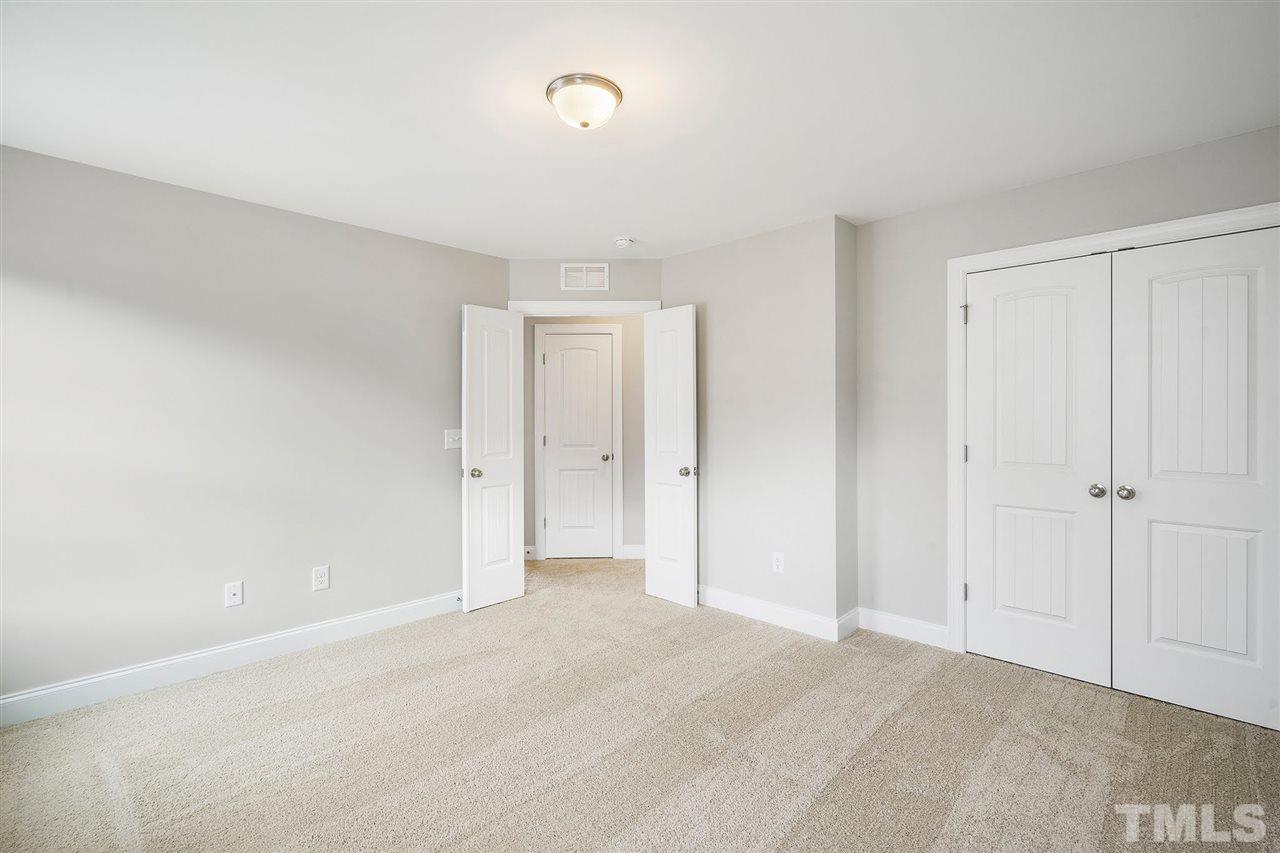 112 Edmer Lane Garner, NC 27529 - Photo 14 of 24 a view of an empty room