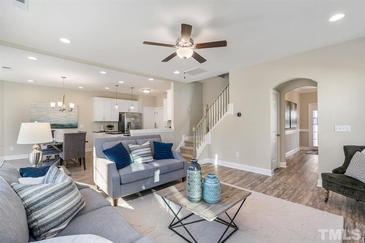112 Edmer Lane Garner, NC 27529 - Photo 10 of 24 a living room with furniture and kitchen view