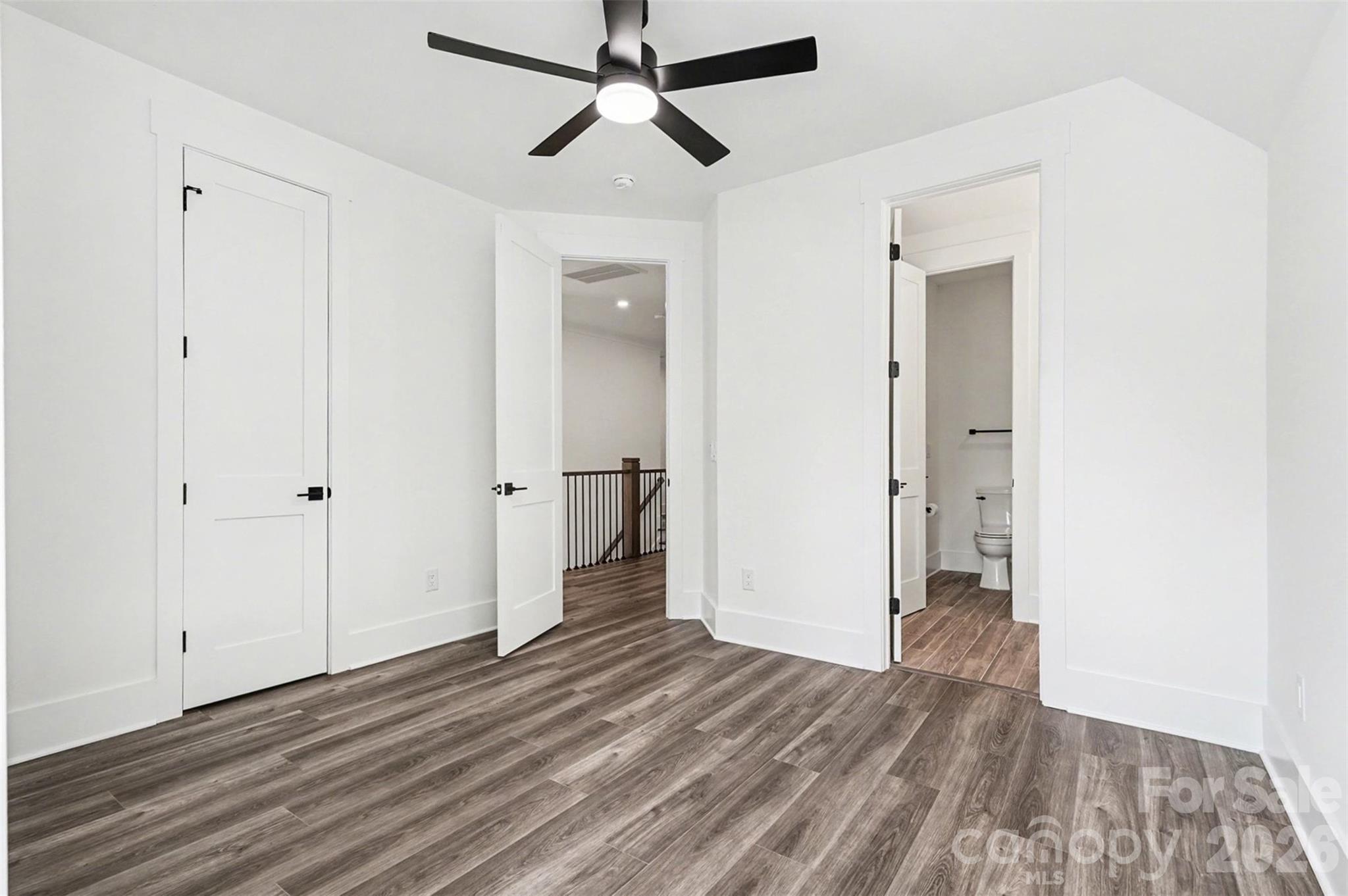 149 Shady Cove Road Troutman, NC 28166 - Photo 38 of 48 a view of empty room with wooden floor