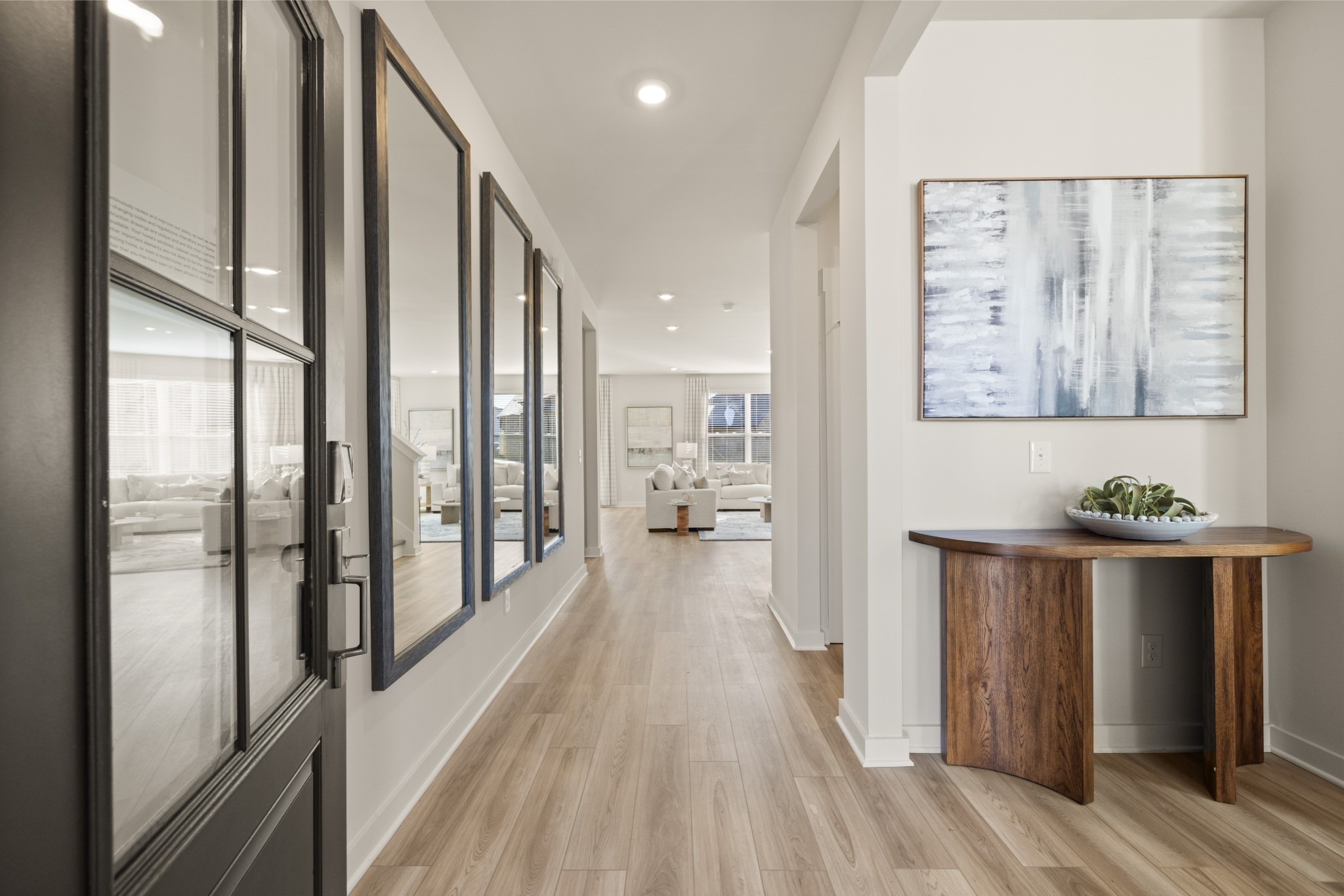 6364 North New Hope Road Hermitage, TN 37076 - Photo 2 of 56 a view of a hallway with wooden floor and living room