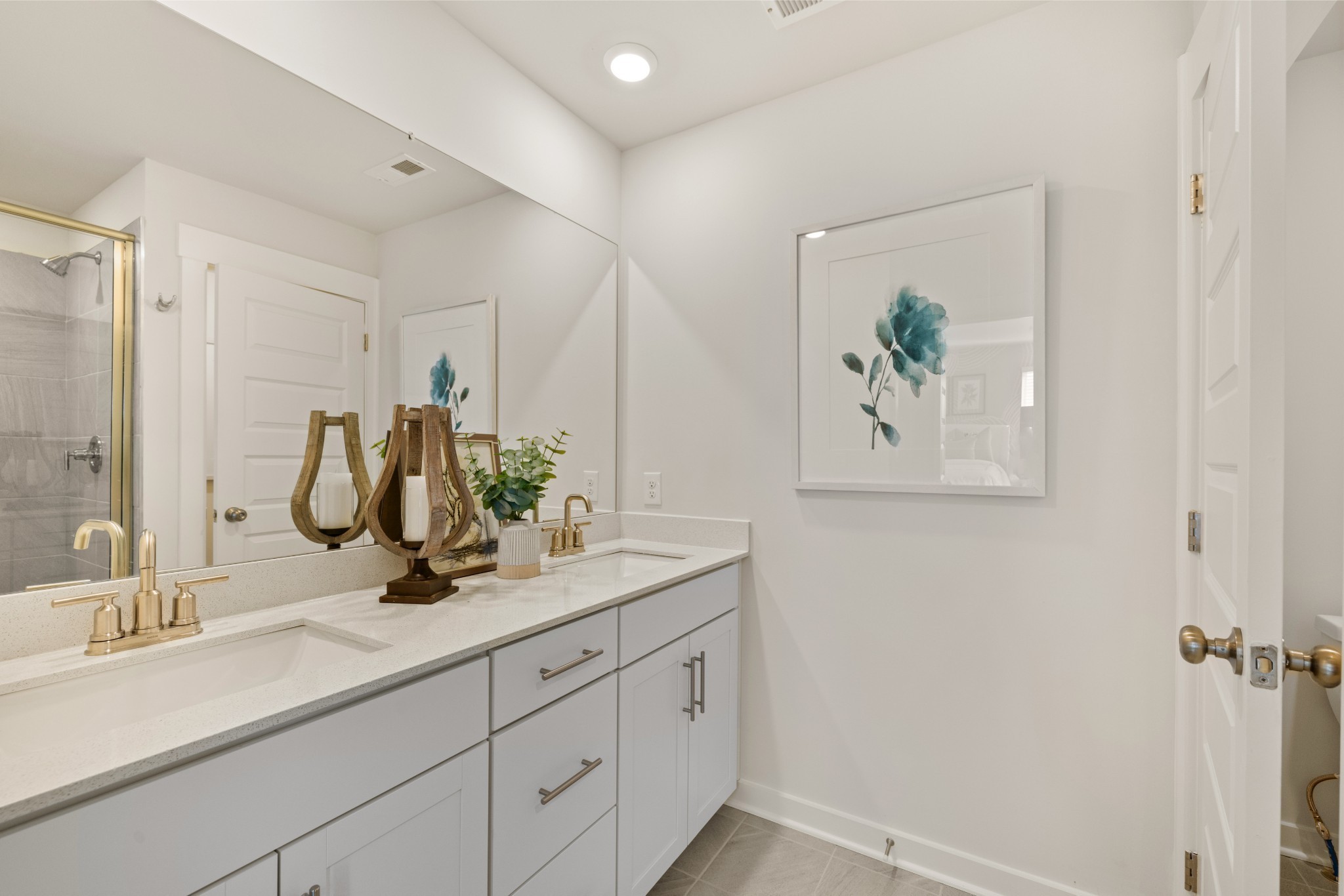 6364 North New Hope Road Hermitage, TN 37076 - Photo 33 of 56 a bathroom with a double vanity sink and a mirror