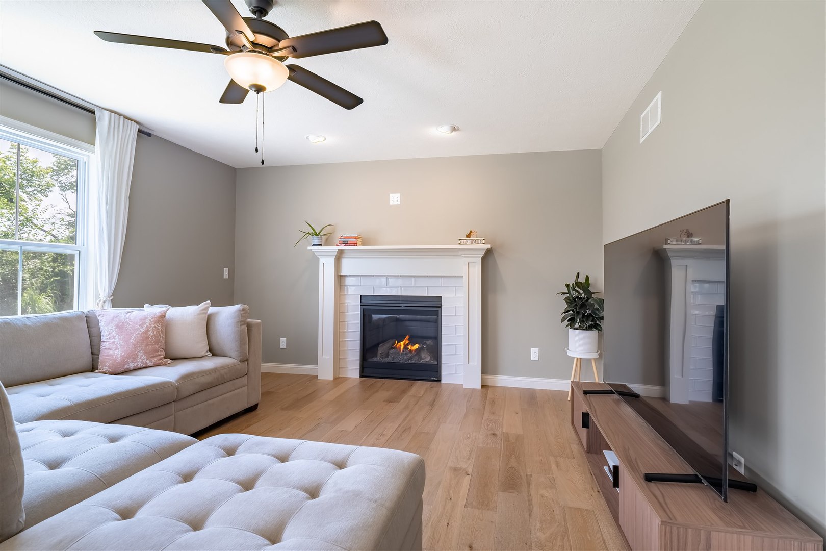 2512 Savanna Road Bloomington, IL 61705 - Photo 15 of 31 a living room with furniture and a fireplace