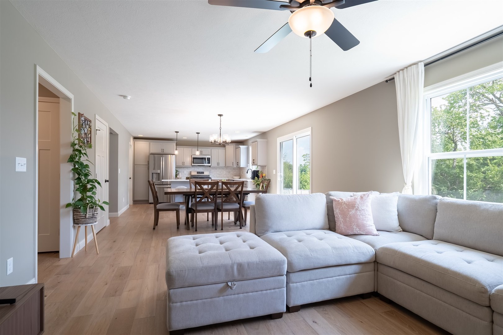 2512 Savanna Road Bloomington, IL 61705 - Photo 16 of 31 a living room with furniture and a large window