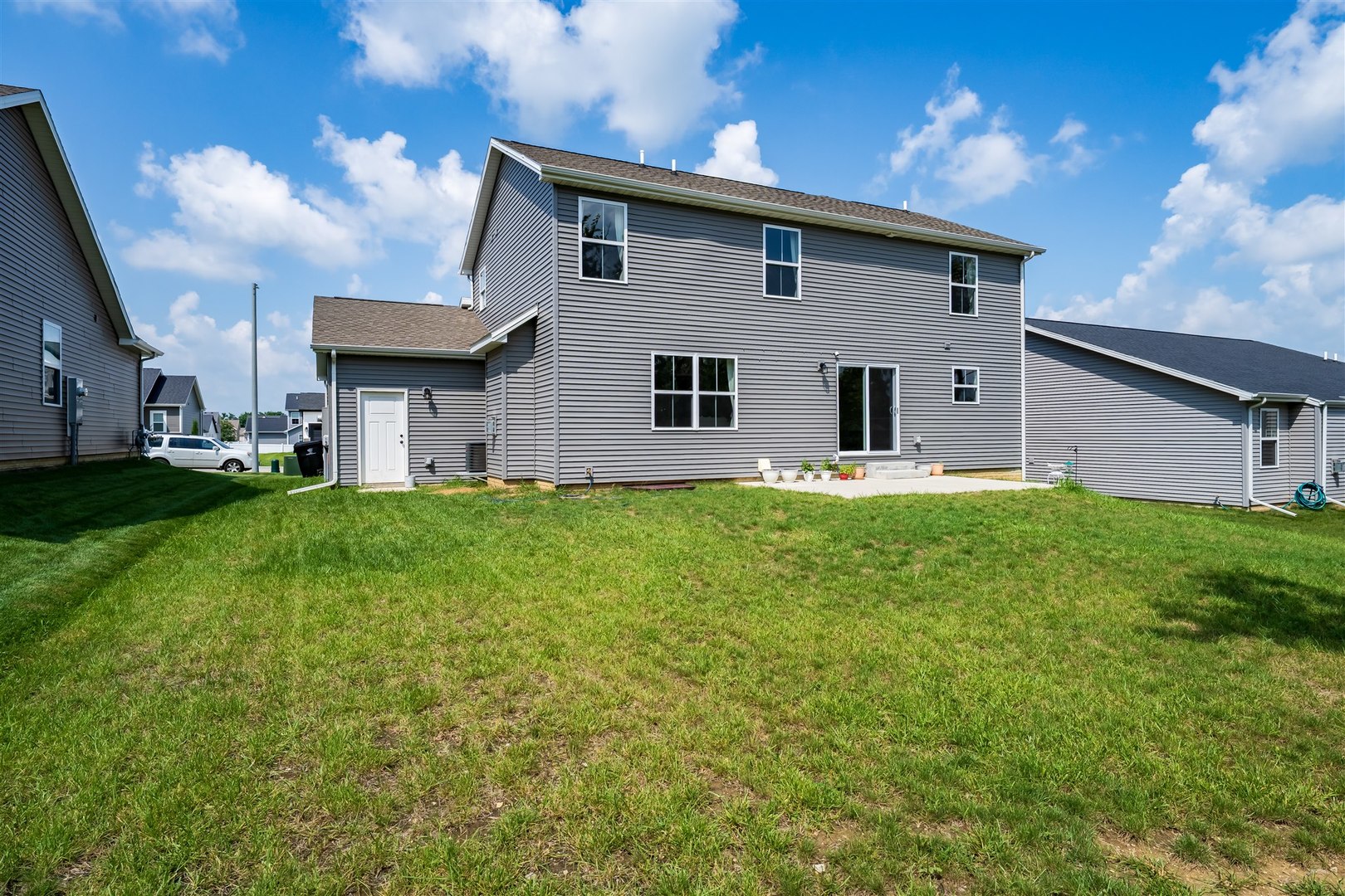 2512 Savanna Road Bloomington, IL 61705 - Photo 29 of 31 a front view of house with yard and green space