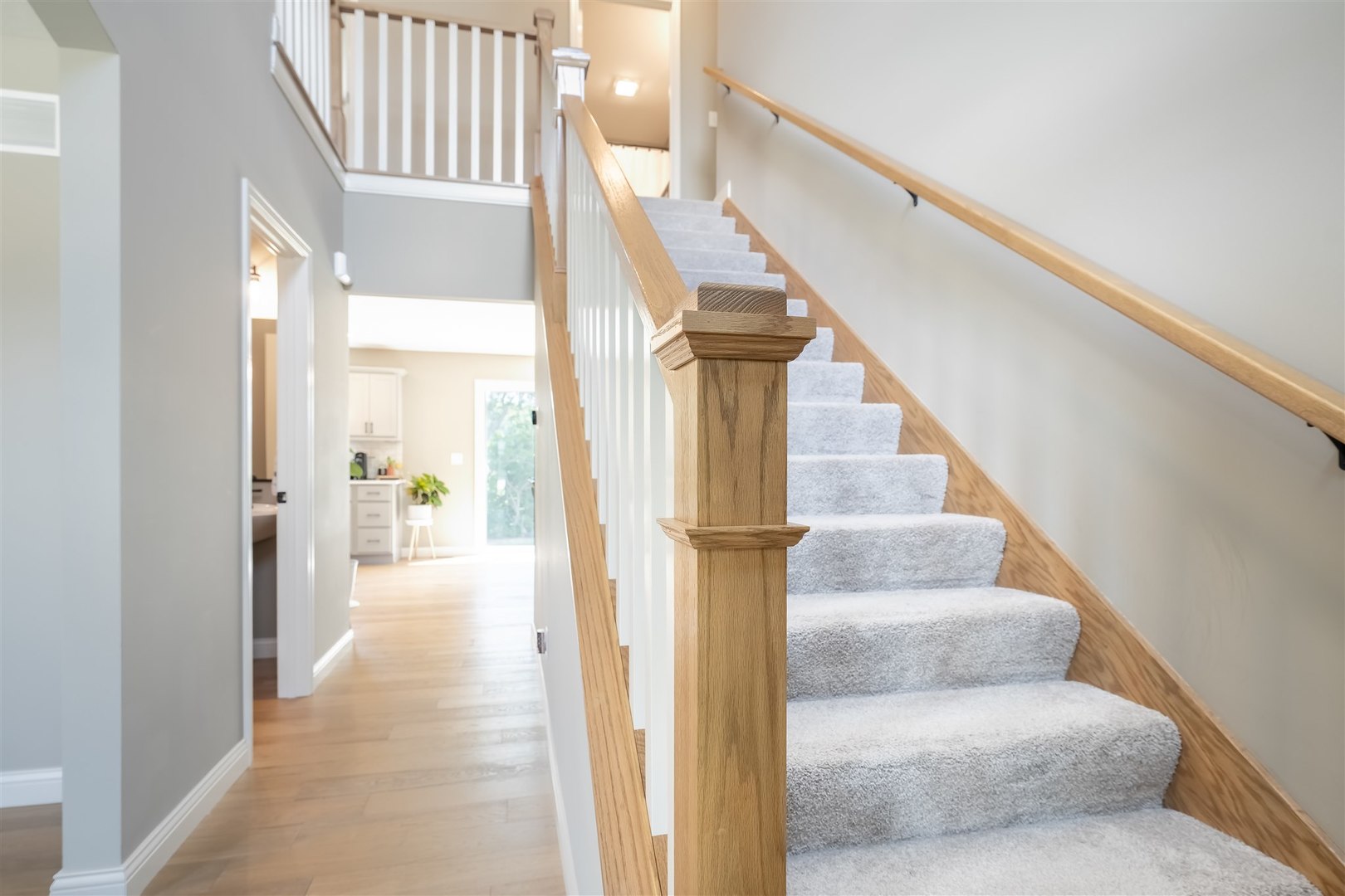 2512 Savanna Road Bloomington, IL 61705 - Photo 8 of 31 a view of entryway and hall with wooden floor