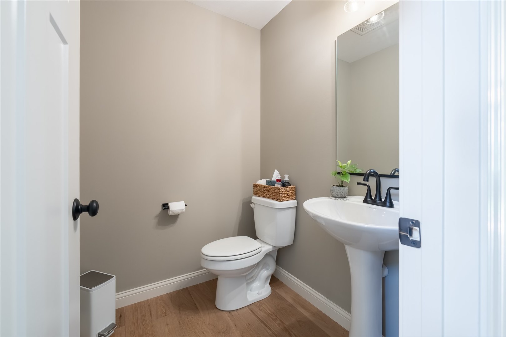 2512 Savanna Road Bloomington, IL 61705 - Photo 9 of 31 a white toilet sitting next to a bathroom sink