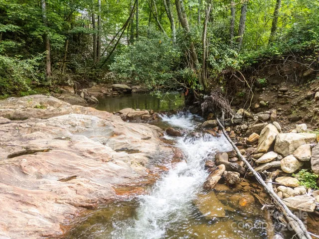 a view of a backyard of a house