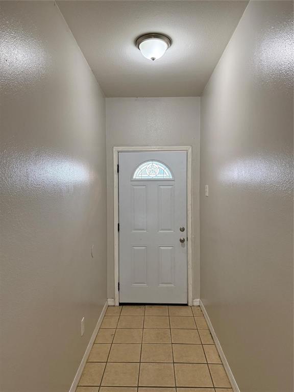 1823 Smoke Tree Lane Dallas, TX 75253 - Photo 2 of 13 an empty room with closet