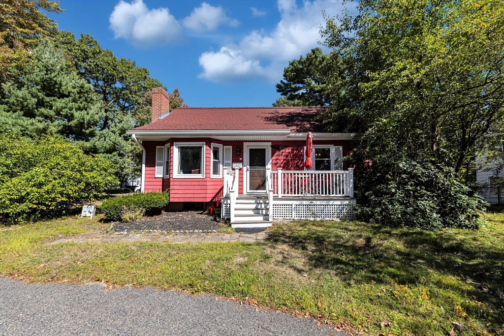 324 Central Avenue Dedham, MA 02026 - Photo 1 of 27 a front view of a house with a garden