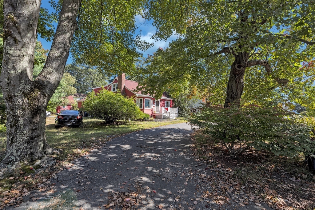 324 Central Avenue Dedham, MA 02026 - Photo 2 of 27 a childrens park with lots of trees