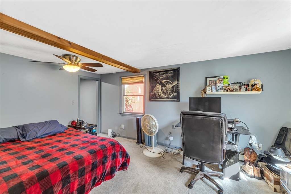 324 Central Avenue Dedham, MA 02026 - Photo 21 of 27 a bedroom with a bed and a desk