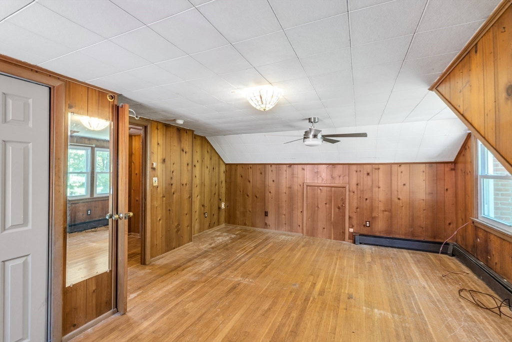 324 Central Avenue Dedham, MA 02026 - Photo 7 of 27 wooden floor in an empty room with a window
