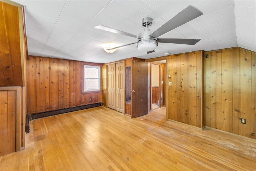 324 Central Avenue Dedham, MA 02026 - Photo 8 of 27 a view of an empty room with a window