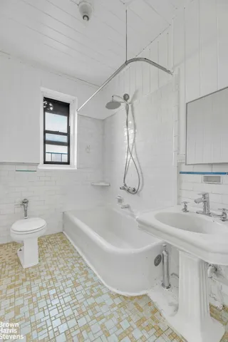 a bathroom with a sink and a bathtub