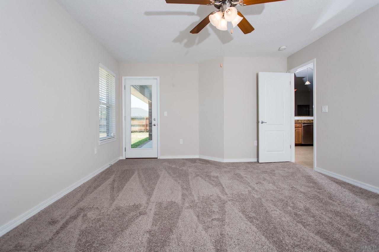 2281 Pine Hammock Road Navarre, FL 32566 - Photo 21 of 44 Master Bedroom