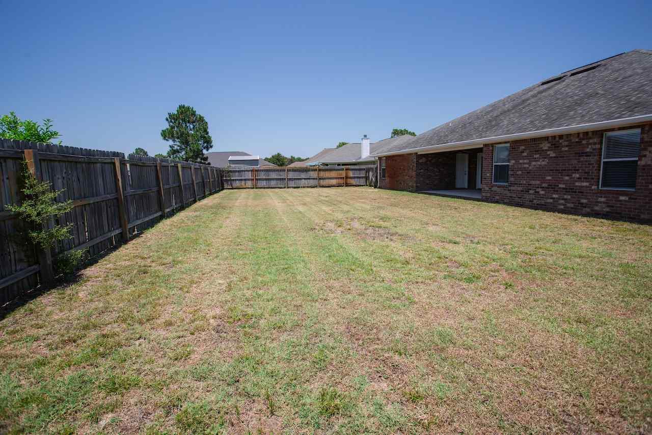 2281 Pine Hammock Road Navarre, FL 32566 - Photo 40 of 44 Backyard