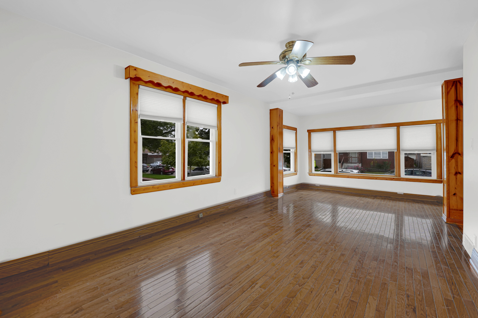 5535 South Kildare Avenue, Unit 1 Chicago, IL 60629 - Photo 18 of 23 a view of an empty room with wooden floor and a window