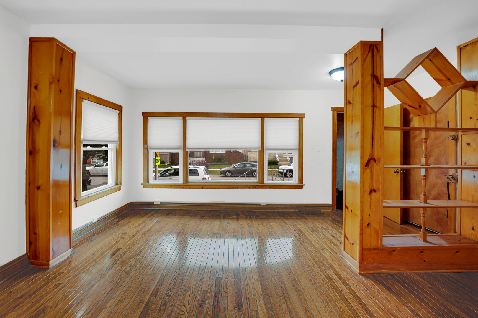 5535 South Kildare Avenue, Unit 1 Chicago, IL 60629 - Photo 19 of 23 wooden floor in an empty room with a window