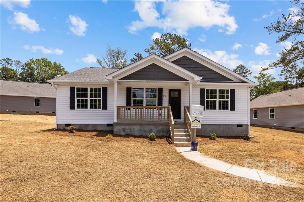 951 Pine Ridge Road, Unit 1 Chester, SC 29706 - Photo 1 of 31 a front view of a house with a yard