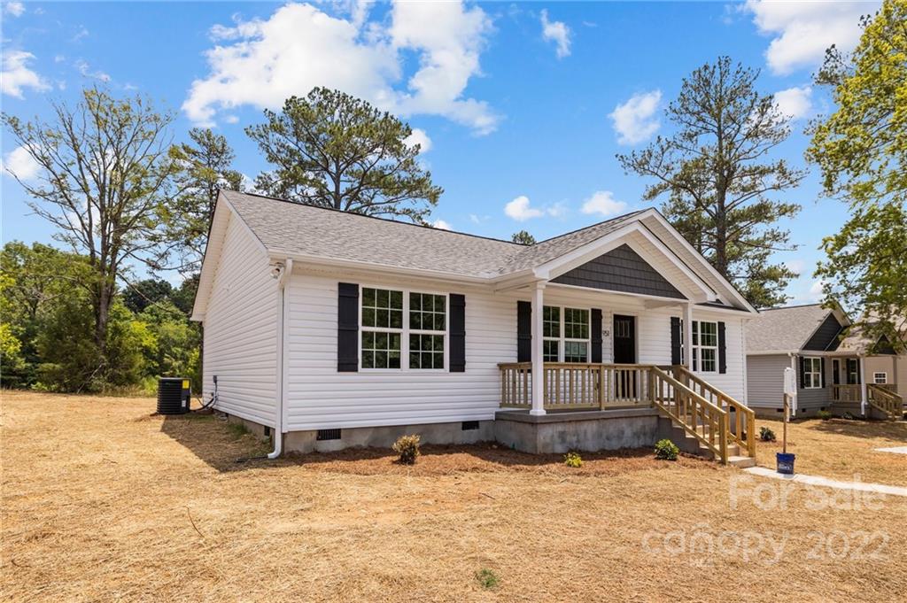 951 Pine Ridge Road, Unit 1 Chester, SC 29706 - Photo 2 of 31 a front view of a house with a yard covered with snow