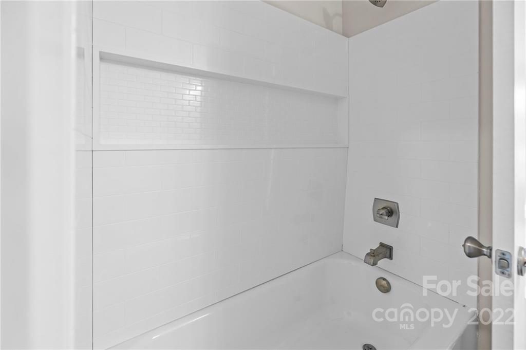 951 Pine Ridge Road, Unit 1 Chester, SC 29706 - Photo 31 of 31 a bathroom with a bathtub