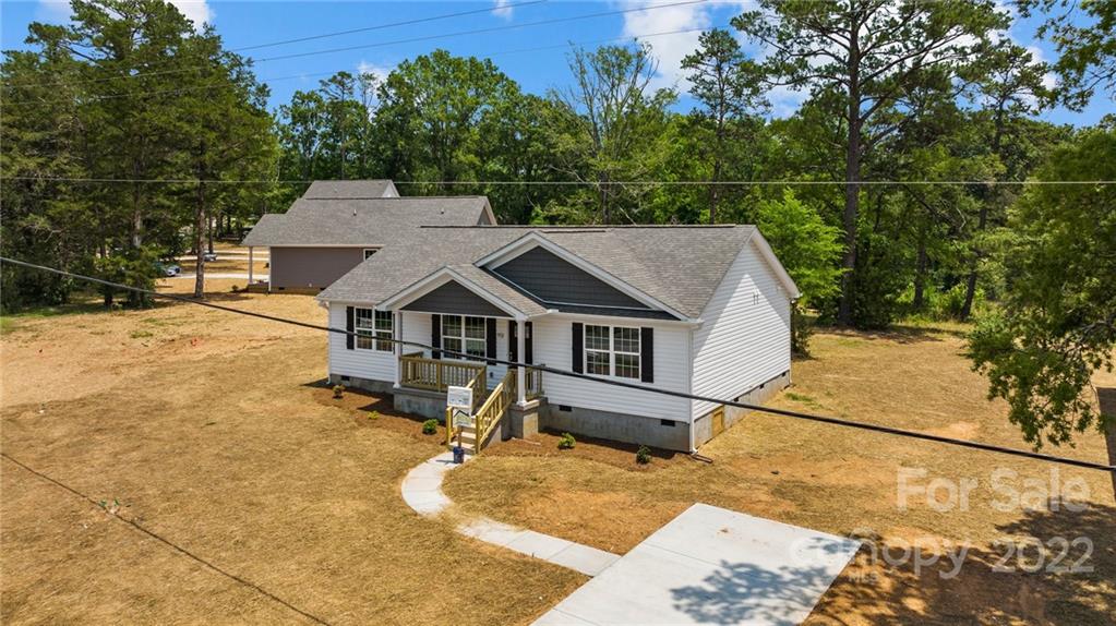 951 Pine Ridge Road, Unit 1 Chester, SC 29706 - Photo 7 of 31 a view of a house with a wooden fence