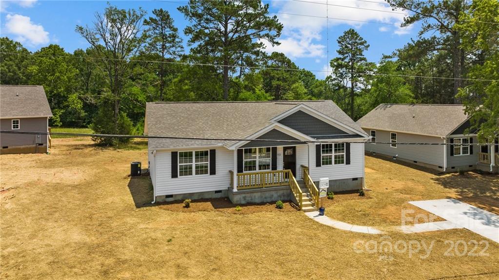951 Pine Ridge Road, Unit 1 Chester, SC 29706 - Photo 8 of 31 an aerial view of a house with yard and trees